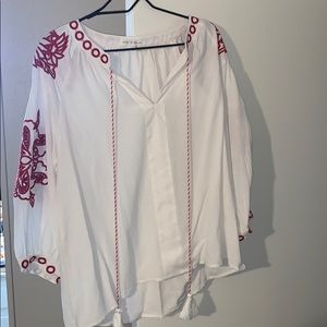 Beautiful white blouse with red detailing